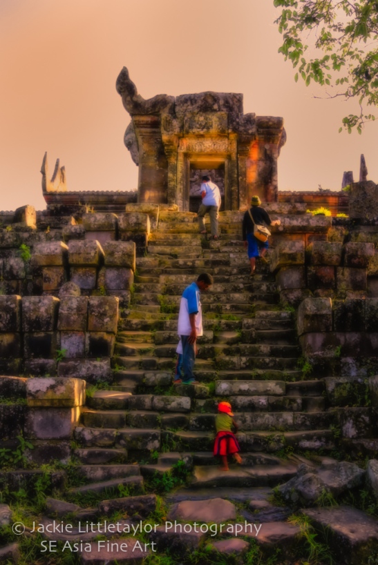 little boy walking up stone stairs preah Vihear impression